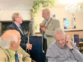 Outgoing President David Burman welcomes incoming President Robbin Suffield
